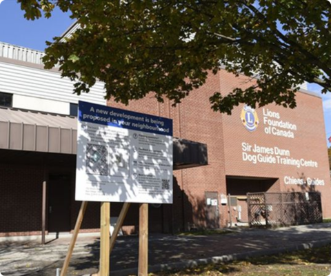 Foundation exterior with sign promoting our new building