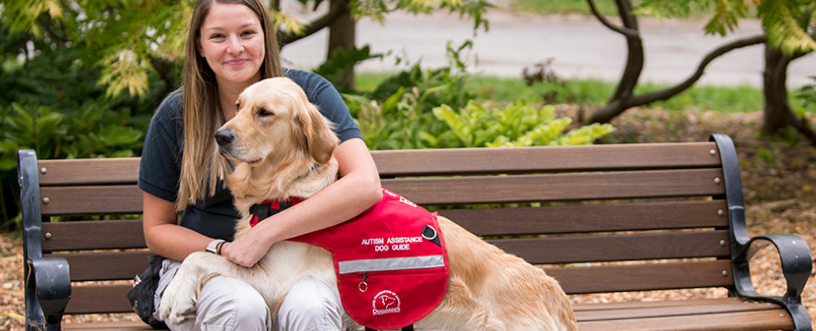 Female instructor with Autism Assistance Dog Guide
