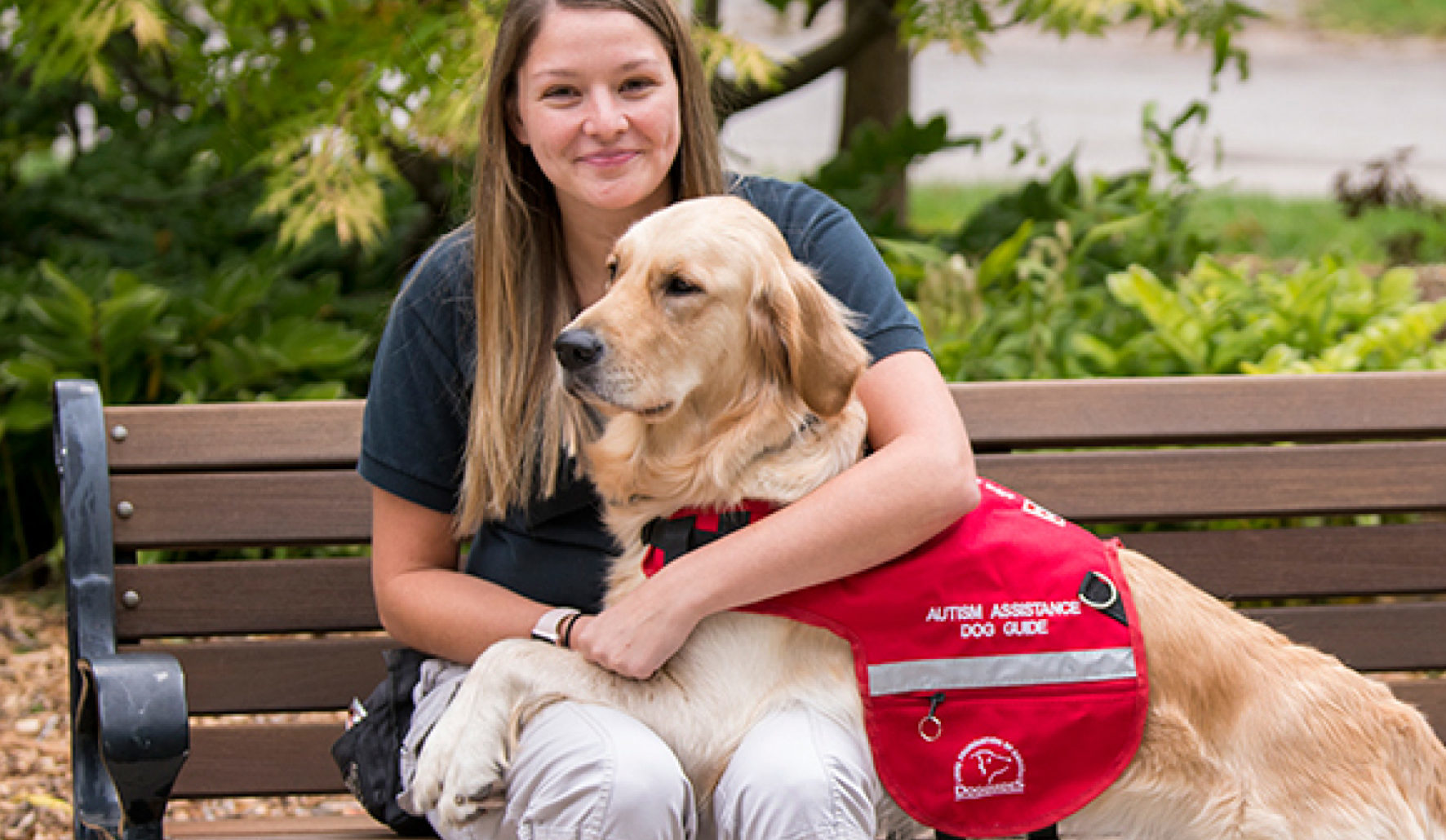 Christina AAD training Female instructor with Autism Assistance Dog Guide