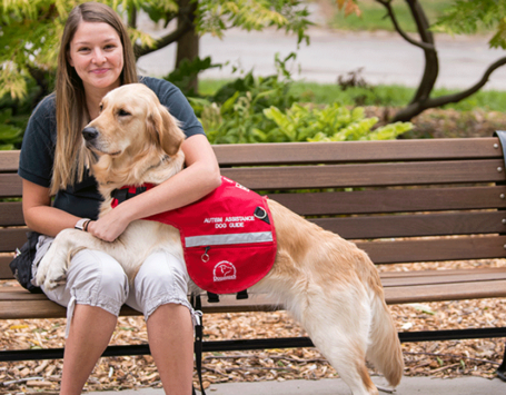 Instructor with Autism Assistance Dog Guide