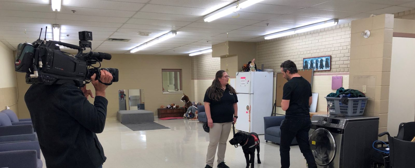 News reporter with a Dog Guide instructor