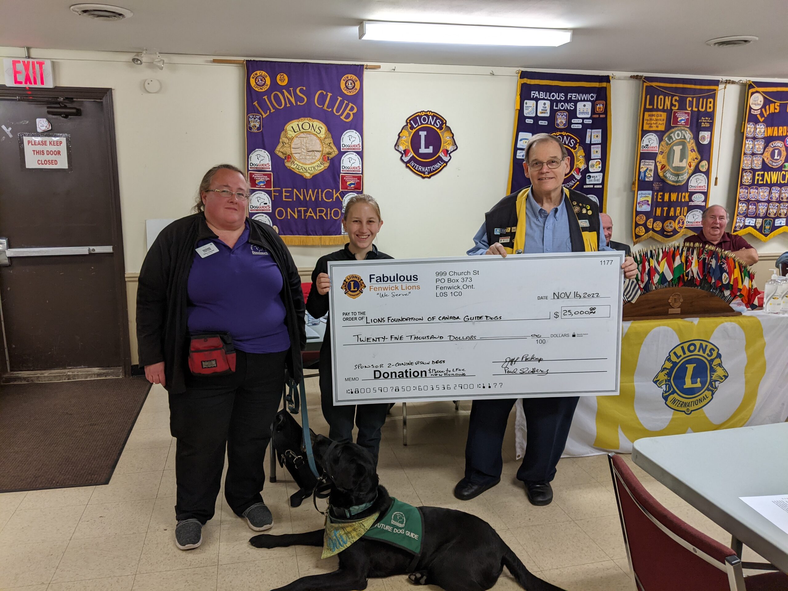 Fenwick Lions Club 2 Lions club hand over cheque to Dog Guides' staff